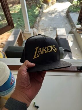 Mitchell & Ness Black Snapback Hat with Gold Tag